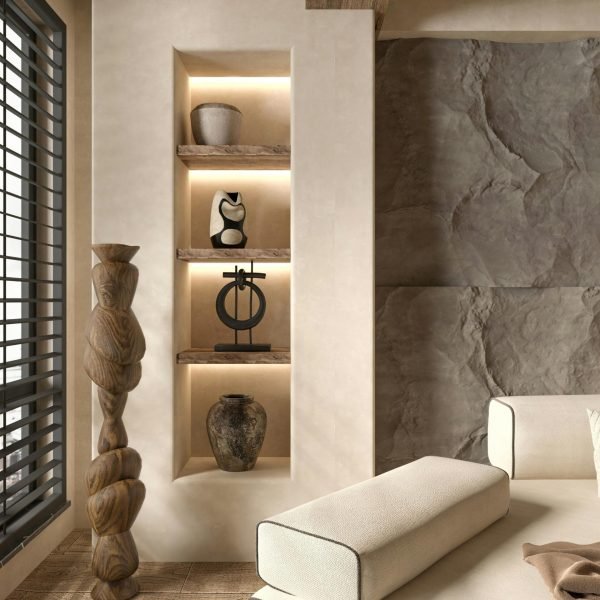 Elegant living room featuring minimalist decor with a luxurious touch and warm lighting.